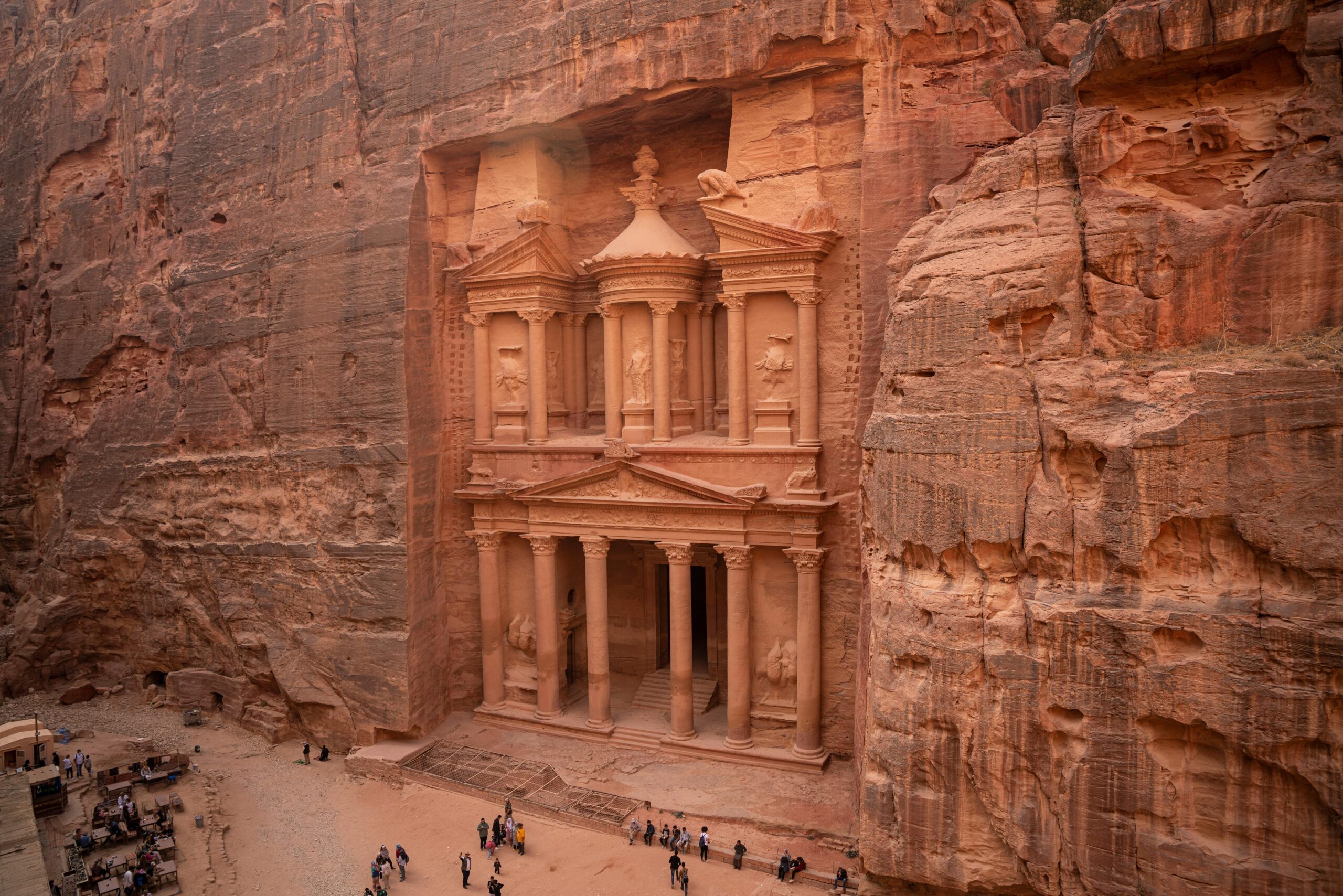 Explore the iconic Treasury at Petra, Jordan, a stunning ancient landmark carved into sandstone cliffs.
